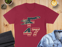 Load image into Gallery viewer, Red t-shirt with distressed US flag patterned "F 47" airplane graphic.
