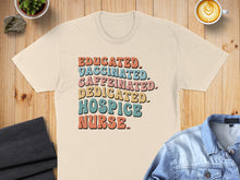 Load image into Gallery viewer, T-shirt with "Educated. Caffeinated. Dedicated. Hospice Nurse." text.
