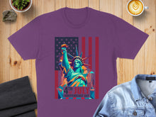 Load image into Gallery viewer, Purple t-shirt with Statue of Liberty and American flag graphic, "4th of July" text.

