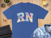 Load image into Gallery viewer, Blue t-shirt with patchwork "RN" lettering.
