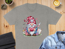 Load image into Gallery viewer, Gray t-shirt featuring a gnome with a stethoscope holding a heart labeled "NURSE".
