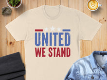 Load image into Gallery viewer, Cream t-shirt with "UNITED WE STAND" text and three stars.
