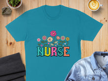 Load image into Gallery viewer, Teal t-shirt with colorful "NURSE" text and floral accents.
