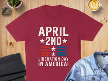 Load image into Gallery viewer, Burgundy t-shirt with "April 2nd Liberation Day In America!" and patriotic stars.
