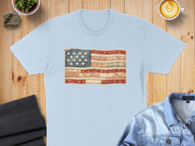Load image into Gallery viewer, Light blue t-shirt with a distressed American flag design.
