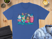 Load image into Gallery viewer, Blue t-shirt with "Emergency Nurse" text and coffee cup illustrations.
