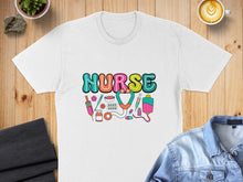 Load image into Gallery viewer, White t-shirt with colorful "NURSE" text and medical icons.
