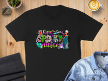 Load image into Gallery viewer, Black t-shirt with "One Spooky Nurse" text and Halloween-themed graphic.

