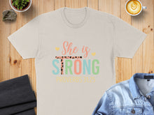 Load image into Gallery viewer, Beige t-shirt with "She is STRONG PROVERBS 31:25" text and leopard print.
