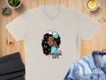 Load image into Gallery viewer, Cream t-shirt with a graphic of a nurse with butterflies and "# NURSE LIFE".

