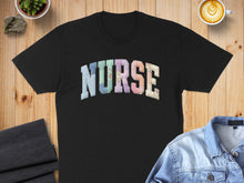 Load image into Gallery viewer, Black t-shirt with "NURSE" in a patchwork quilt font.
