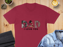 Load image into Gallery viewer, Burgundy t-shirt with "DAD I LOVE YOU" text featuring camouflage, flag, and wood textures.
