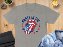 Load image into Gallery viewer, Gray t-shirt with "Party in the USA" and a patriotic tongue logo.
