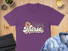 Load image into Gallery viewer, Purple t-shirt with "Blessed Nurse" text and colorful wavy lines.
