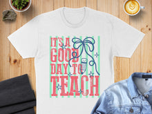 Load image into Gallery viewer, White t-shirt with "It's a good day to teach" text and pencil graphic.
