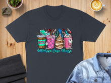 Load image into Gallery viewer, T-shirt graphic featuring coffee cups, medical tools, and text: "Intensive Care Nurse".
