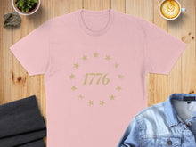 Load image into Gallery viewer, Pink t-shirt with a distressed 1776 star emblem.
