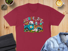 Load image into Gallery viewer, Burgundy t-shirt with "Nurse Life" text and a cartoon truck filled with medical supplies.
