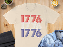 Load image into Gallery viewer, Cream t-shirt with repeating "1776" in red, white, and blue stripes.
