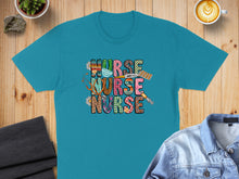 Load image into Gallery viewer, Teal t-shirt with "NURSE NURSE" text in colorful, patterned letters.
