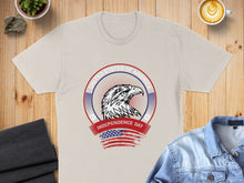 Load image into Gallery viewer, Beige t-shirt with United States of America Independence Day eagle graphic.
