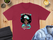 Load image into Gallery viewer, Maroon t-shirt with "Keep Calm I'm a Nurse" graphic featuring a woman with butterflies.
