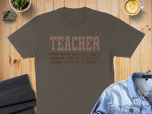 Load image into Gallery viewer, Brown t-shirt with "TEACHER" and "Some days I rock it, some days it rocks me, either way we rockin' it" text.
