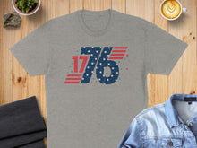 Load image into Gallery viewer, Grey t-shirt with "1776" in distressed American flag design.
