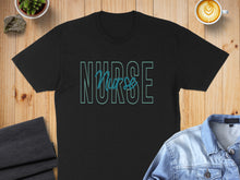 Load image into Gallery viewer, Black t-shirt with "NURSE" in teal block lettering, laid flat with coffee and denim.
