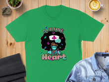 Load image into Gallery viewer, Green t-shirt with graphic of a Black nurse with curly hair and butterfly accents.
