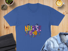 Load image into Gallery viewer, Blue t-shirt with "Nurse" in colorful Halloween-themed lettering.

