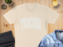 Load image into Gallery viewer, Cream t-shirt with "TEACHER" in a checkered pattern.
