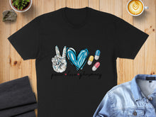 Load image into Gallery viewer, Black t-shirt with peace sign, heart, pills, and "peace love pharmacy" text.
