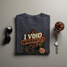 Load image into Gallery viewer, Dark gray t-shirt with "I Void Warranties" graphic of electronics repair.
