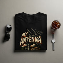 Load image into Gallery viewer, Black t-shirt with "MY ANTENNA" text and an illustration of an antenna and cabin.
