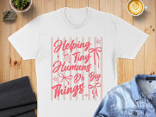 Load image into Gallery viewer, White t-shirt with "Helping Tiny Humans Do Big Things" text and graphic.
