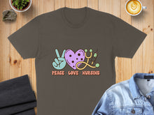 Load image into Gallery viewer, Brown t-shirt with "Peace Love Nursing" text, peace sign, heart, and stethoscope.

