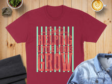 Load image into Gallery viewer, Maroon t-shirt with "Helping Little Minds Grow" text.
