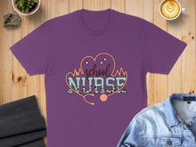 Load image into Gallery viewer, Purple t-shirt with "School Nurse" text and stethoscope graphic.
