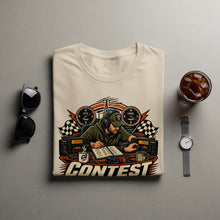 Load image into Gallery viewer, T-shirt graphic shows a ham radio operator with radios, clocks, flags, and the word CONTEST.
