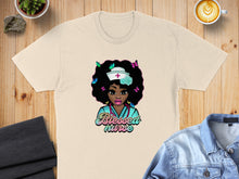 Load image into Gallery viewer, Cream t-shirt with a colorful graphic of a nurse with butterflies and "Blessed nurse" text.
