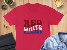 Load image into Gallery viewer, Red, White, Blessed text on a red t-shirt with denim jacket and coffee.
