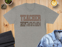 Load image into Gallery viewer, Grey t-shirt with "TEACHER SOME DAYS I ROCK IT SOME DAYS IT ROCKS ME EITHER WAY WE ROCKIN' IT" text.
