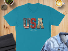 Load image into Gallery viewer, Teal t-shirt with "USA EST. 1776" text and distressed flag design.
