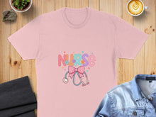 Load image into Gallery viewer, Pink t-shirt with "NURSE" text, stethoscope, and pastel floral accents.
