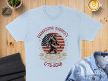 Load image into Gallery viewer, Bigfoot wearing a flag pattern in a circular emblem with "CELEBRATING AMERICA'S 4TH SEMIQUINCENTENNIAL 1776-2026".
