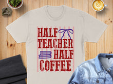 Load image into Gallery viewer, T-shirt with "Half Teacher Half Coffee" text and blue bow detail.
