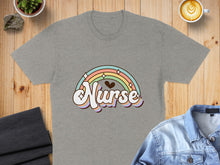 Load image into Gallery viewer, Grey t-shirt with pastel rainbow and "Nurse" text.

