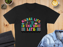 Load image into Gallery viewer, Black t-shirt with colorful "Nurse Life is the Best Life" text and medical icons.
