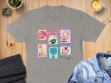 Load image into Gallery viewer, Gray t-shirt with school-themed icons on a light pink grid.
